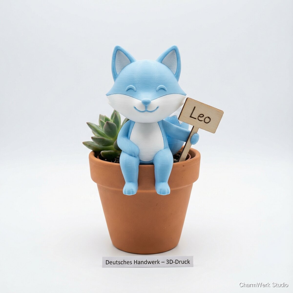 Kleiner Pflanzenbuddy mit Namensschild