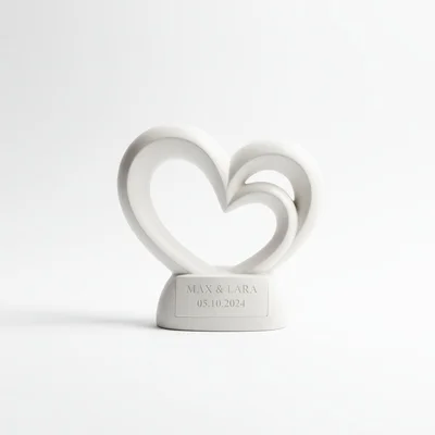 Ringhalter-Skulptur in Herzform mit Gravurfläche