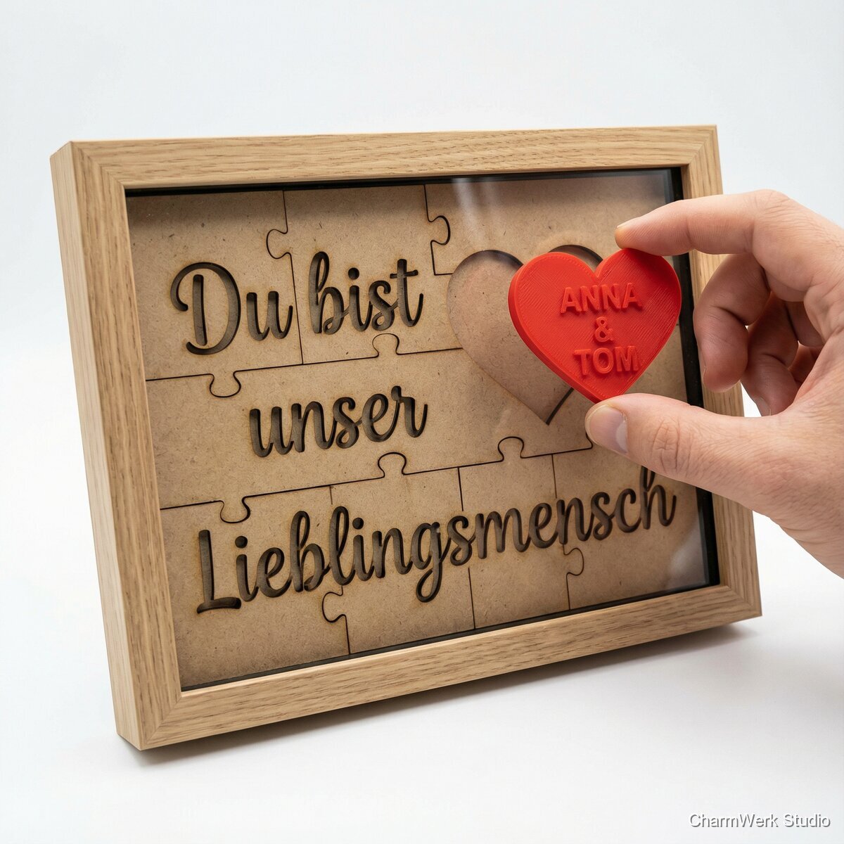 Puzzle-Message im Rahmen mit 3D-Herz als Abschlussstück - Seitenansicht