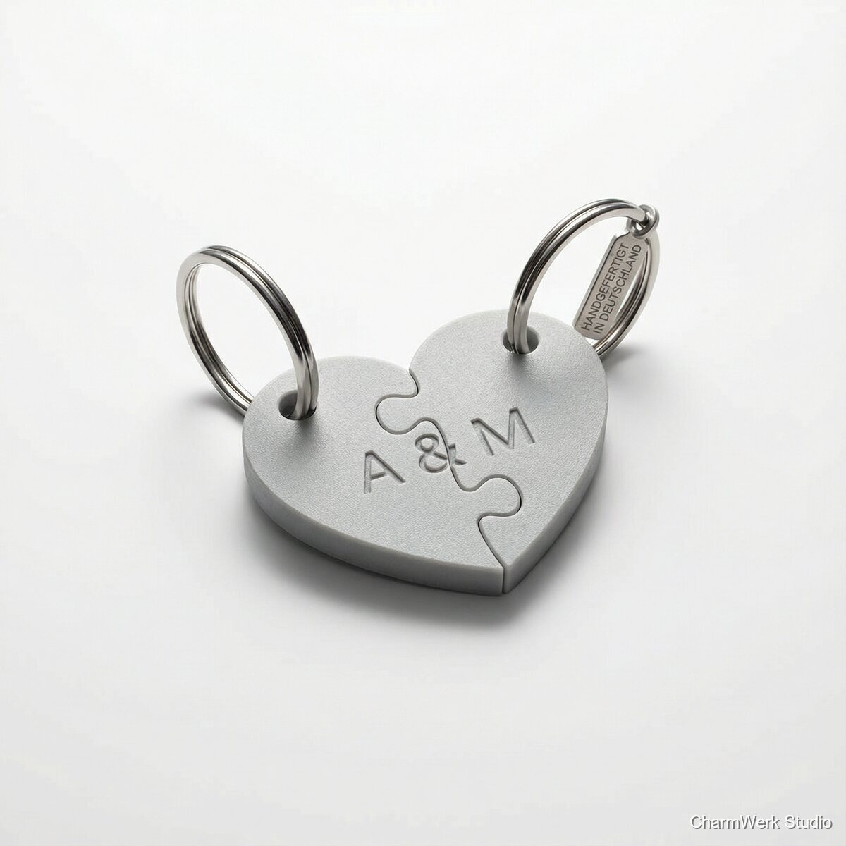 Paar-Schlüsselanhänger als Puzzle-Hälften